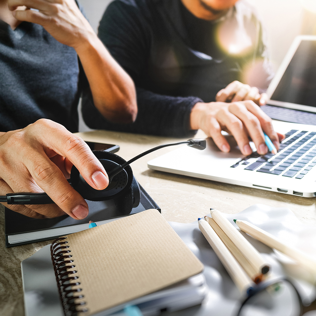 Image of a person getting help with his VOIP set up