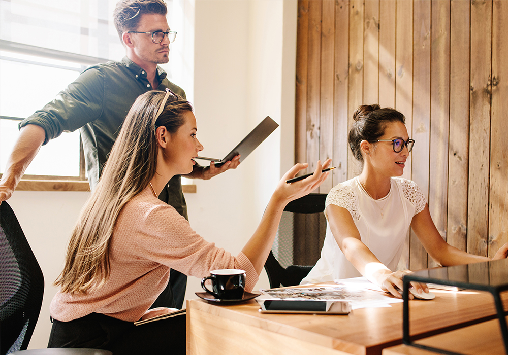 Workers discussing in meeting