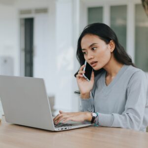img of a woman on the phone
