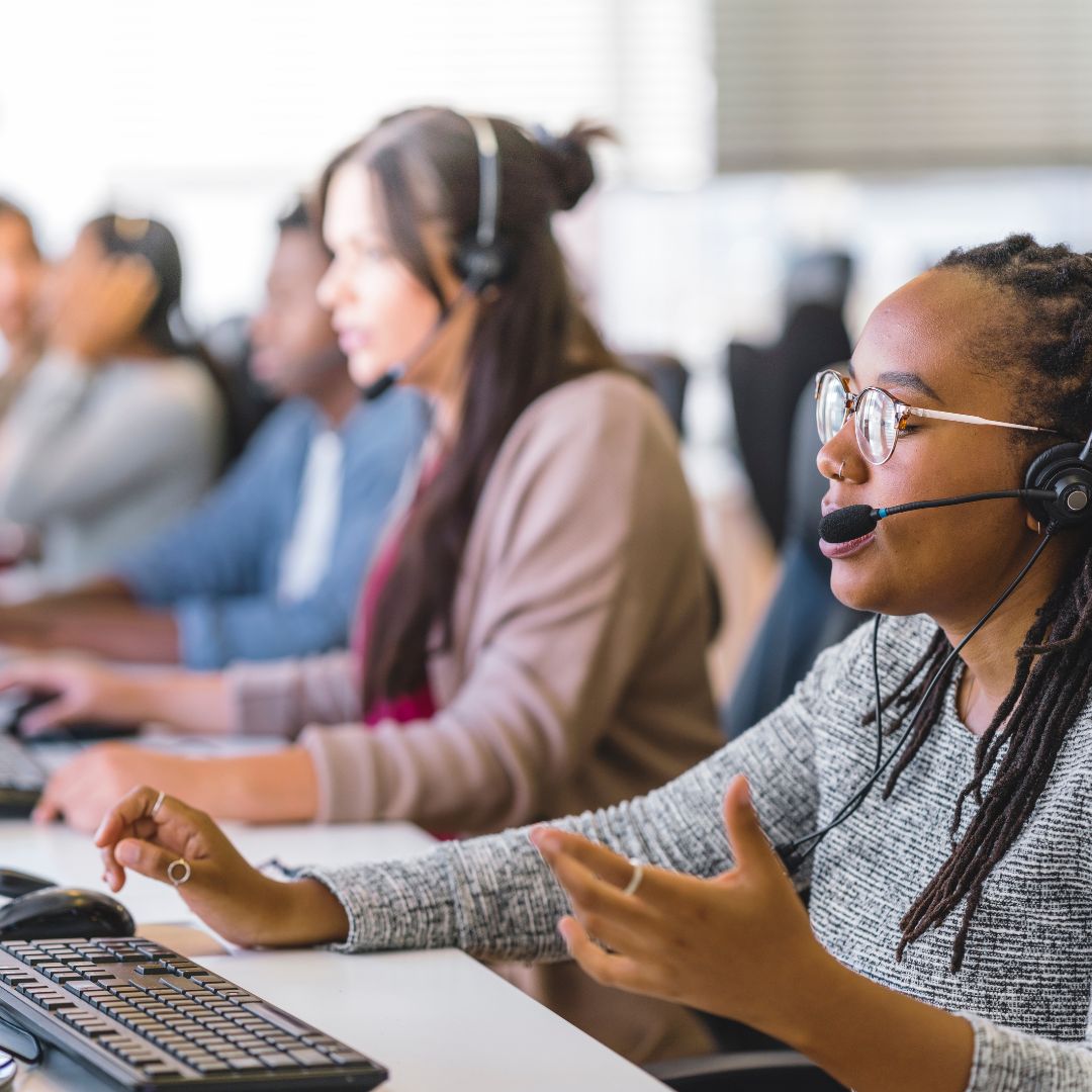 customer service workers at their desk