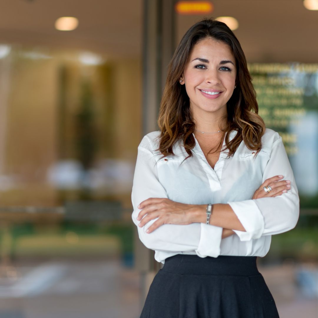 business owner standing outside her business